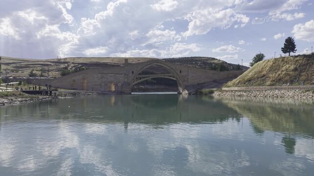 Cinematic View of Malabadi Bridge in Diyarbakir, Turkiye &ndash; Medieval Stone Arch Bridge Above Batman River