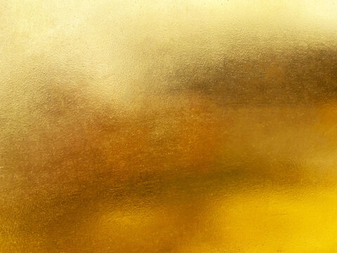 Gold metal background or texture  and gradients shadow horizontal shape, copy space (High resolution), real photo