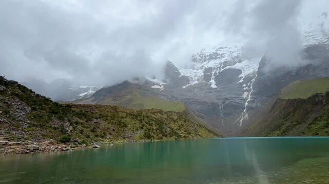 Humantay lagoon with Andean mountain range and glacier in Peru