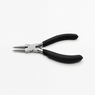 Generic retaining ring pliers hand tool isolated on white.