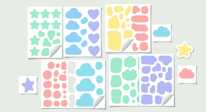 Colorful sticker sheets arranged in a collage on a light wall