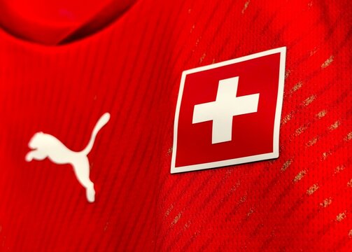Photo of the emblem of the Switzerland national football team&rsquo;s 2026 home kit. The Switzerland national football team represents Switzerland in men's international football.