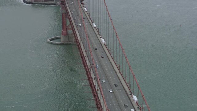 Golden Gate Bridge Tower Base and Traffic - High, Aerial Shot On Overcast Day