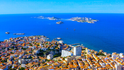 Naklejka premium Aerial view of Marseille coastline with residential districts, Chateau d'If and Frioul Islands in the Mediterranean Sea, France
