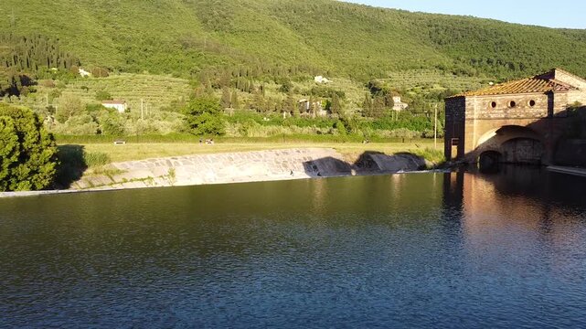 Unveiling Shot at Sunset on Cavalciotto Waterfall in Prato Tuscany Italy