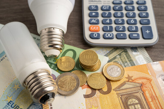 Cost of electric utilities with light bulb for payment.