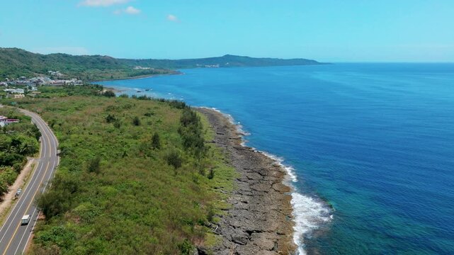 Aerial view of  car on the coast road