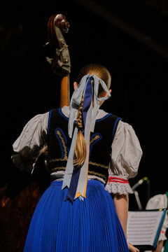 Beautiful girl playing the double bass, contrabass, folklore clef