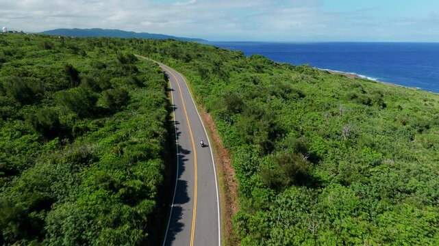 Aerial view of  motorcycle on the coast road
