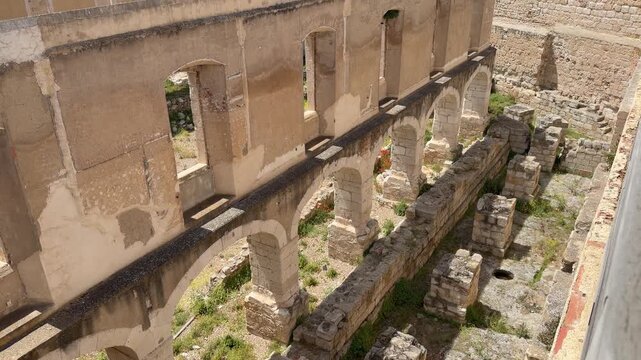 Tall fortified walls and deep castle moat