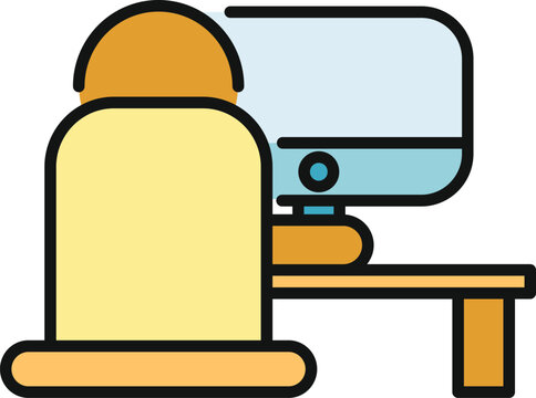 Person sitting at a desk and working on a computer