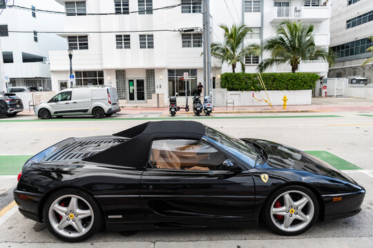 Miami, Florida, USA - July 27, 2025: Ferrari F355 Spider 1996 convertible car. Convertible car Ferrari F355 Spider. Car Ferrari F355 Spider parked outdoor. Black convertible, corner view