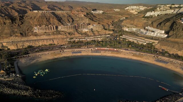 Aerial view of the Playa del Amadores, Amadores Beach, near famous holiday resort Puerto Rico de Gran Canaria on Gran Canaria island in the afternoon sun, Canary Islands, Spain