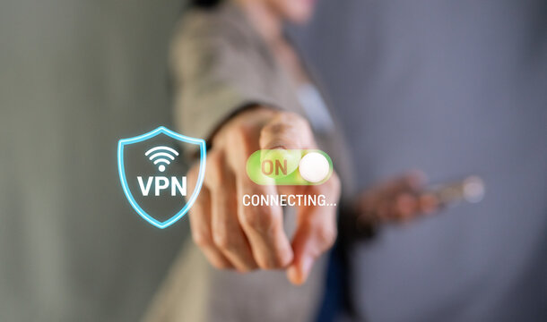 Businesswoman turning on secure VPN connection on smartphone for internet privacy and data protection