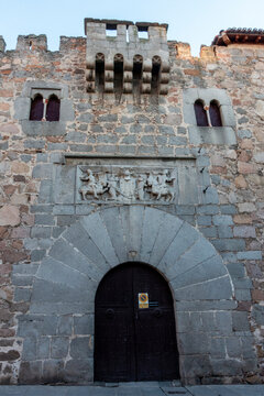 Architectural Detail of the Medieval Gothic Portal and Carved Renaissance Relief Above the Gate of Palacio de los Davila Built Between the 13th and 16th Centuries in Avila, Castile and Leon, Spain