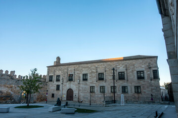 Obraz premium Renaissance Facade of Palacio de Blasco Nunez Vela, a 16th Century Palace Housing the Audiencia Provincial Court in Plaza de la Santa, Avila, Castilla y Leon, Spain