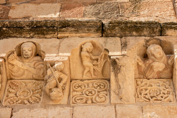 Romanesque Carved Corbels and Metopes with Human Figures from the 12th to 13th Century Cornice of the Church of San Miguel Arcangel in Sotosalbos, Segovia, Castile and Leon, Spain © Nandi Estévez