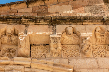 Romanesque Carved Corbels and Metopes with Human Figures from the 12th to 13th Century Cornice of the Church of San Miguel Arcangel in Sotosalbos, Segovia, Castile and Leon, Spain © Nandi Estévez