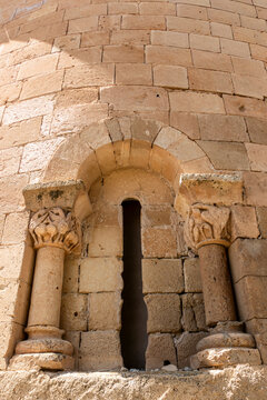 Detail of the 12th-century Romanesque apse window with carved columns and decorated capitals at the Church of San Pedro in San Pedro de Ga&iacute;llos, Segovia, Castile and Le&oacute;n, Spain