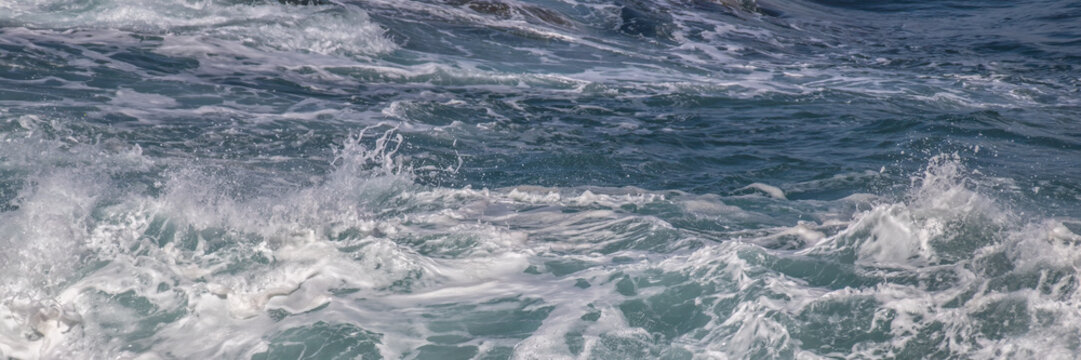 Ocean waves crashing splashing water surface dynamic nature scene for background and texture design