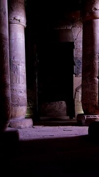 Timeless architectural scene inside the Abydos Temple with towering pillars and historic carvings, reflecting ancient spirituality. Egypt