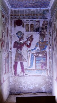 Timeless architectural scene inside the Abydos Temple with towering pillars and historic carvings, reflecting ancient spirituality. Egypt