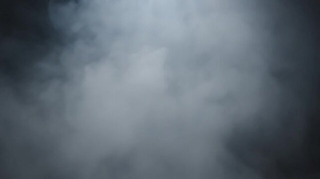 Dense white smoke swirls against a dark and moody background