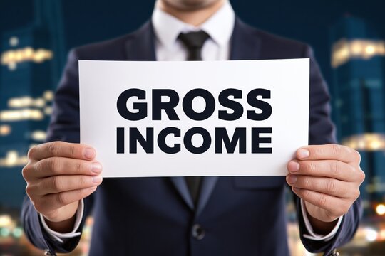 Professional businessman holding paper with gross income phrase