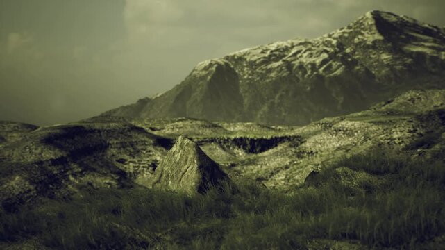 Sunlit grassy foothills with distant snow capped peak, rolling green terrain, scattered rocks, warm light, expansive horizon, serene landscape
