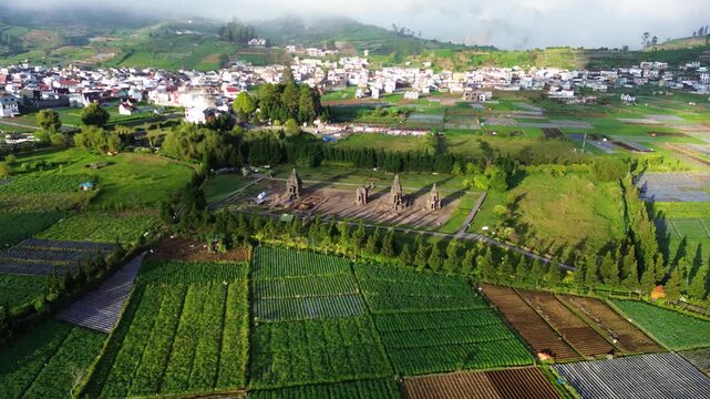 Aerial Drone View of Arjuna Temple Complex at Dieng Plateau, Indonesia During Golden Hour