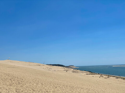 Dune of Pilat panoramic Atlantic coast view over Arcachon Bay under summer clouds, France