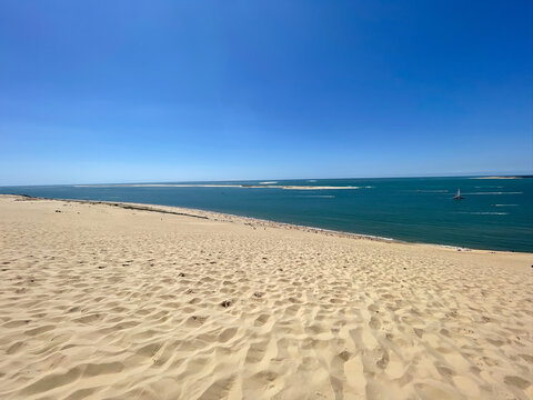 Dune of Pilat panoramic Atlantic coast view over Arcachon Bay under summer clouds, France