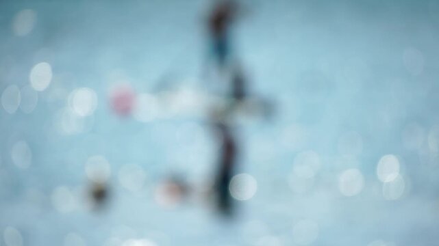 Blur bokeh water abstract background with shimmering light reflections on bright surface, serene summer vacation mood