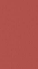 Fototapeta premium Minimal red textured surface with soft grain for clean design layouts, presentations, and marketing banners, providing ample copy space and a calm modern mood.