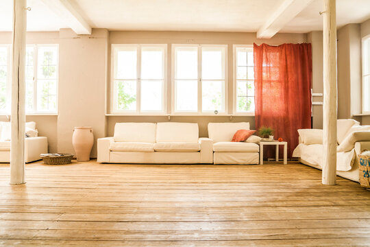 Spacious living room with wooden floor