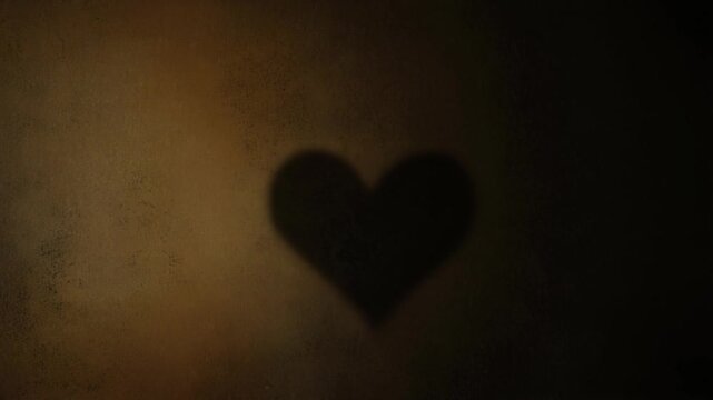 Slow Pan Across Minimalist Textured Wall with Subtle Heart Shaped Shadow in Dimly Lit Room, Artistic Cinematic Full HD Background