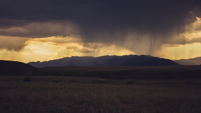 Dzungarian Alatau, sunset, rain