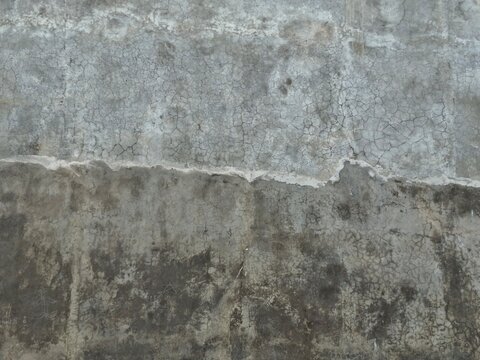 the rough surface texture of the old wall