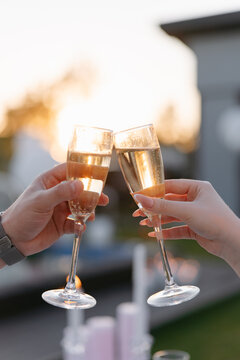 Champagne toast couple hands