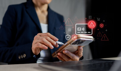 Business woman holding smartphone with credit card fraud warning and financial transaction error icons. © MAUNG