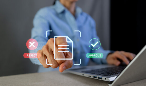 Business woman touching virtual document icon for approve or reject decision concept with laptop.