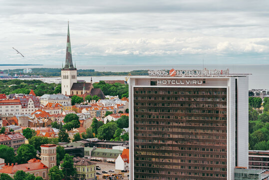 TALLINN, ESTONIA - JUNE 25, 2026: Original Sokos Hotel Viru and St. Olaf church spire.