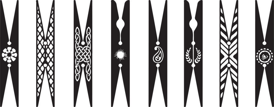 Set of decorative clothespins with various patterns and ornaments