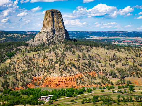 Close Up Aerial View of Devils Tower on a Sunny Day