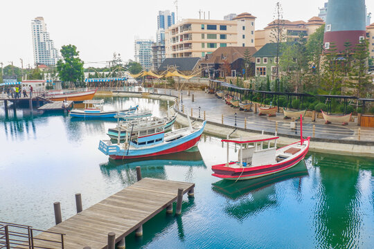 Fisherman house and boats in a bay,fishermen village or market, amsterdam style with old houses and river,Tourists destination,travel concept.