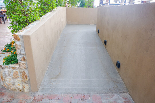Modern Cement concrete walkway to building,outdoor pathway in park or garden,copy space.