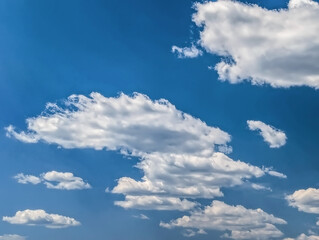 Obraz premium Cumulus cloud nature painting banner with copy space inscription. Blue sky filled many white clouds creating a peaceful and inspiring easy day light landscape scene.