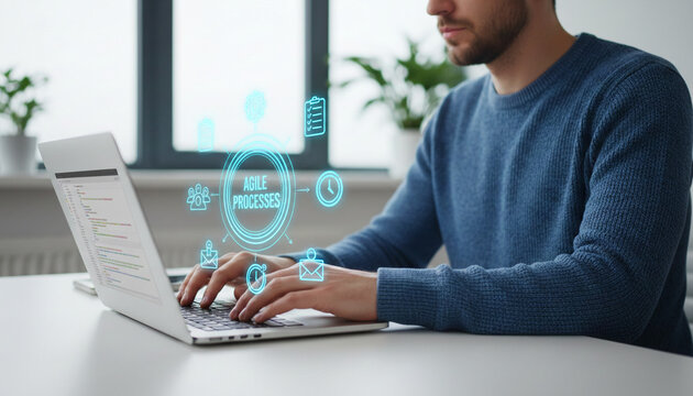 Man typing on laptop with glowing icons of agile processes, representing workflow and efficiency, ideal for business or technology themes