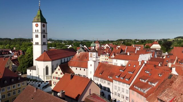 Aerial reveal of Wangen im Allgau town center and Alps