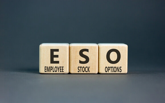 ESO employee stock options symbol. Concept words ESO employee stock options on beautiful wooden blocks. Beautiful grey background. Business ESO employee stock options concept. Copy space.